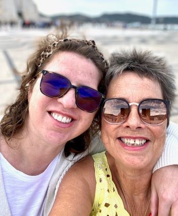Alice and her mum, smiling on holiday