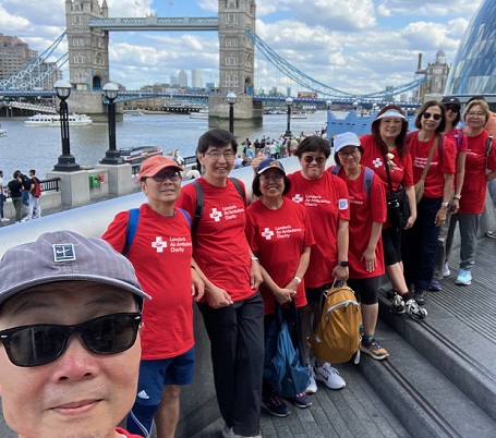 Helipad designer Tom with participants on fundraiser walk for London's Air Ambulance Charity