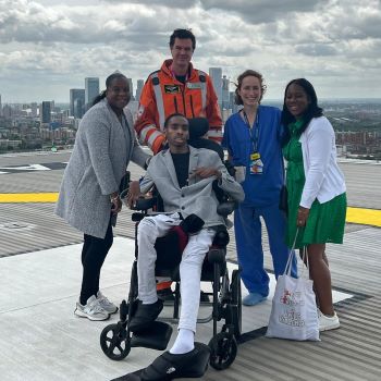 James' family with the London's Air Ambulance crew who saved him