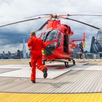 Pilot running to London's Air Ambulance helicopter