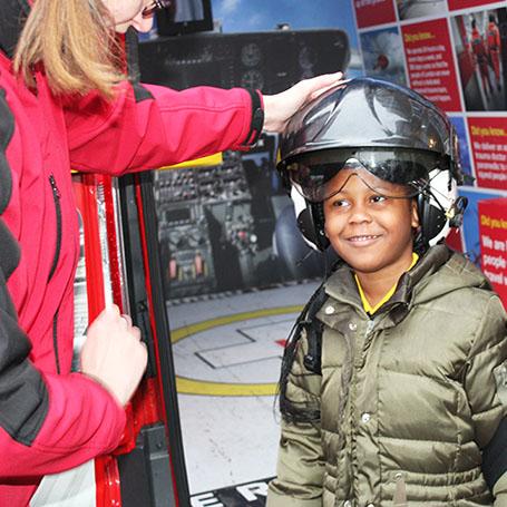 Pupil wearing helmet as part of LAA School visit